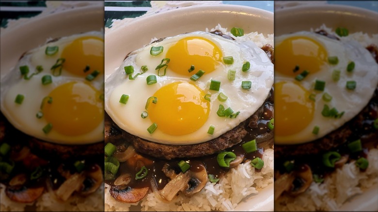 A loco moco dish with eggs and rice at Young's restaurant in Seattle.