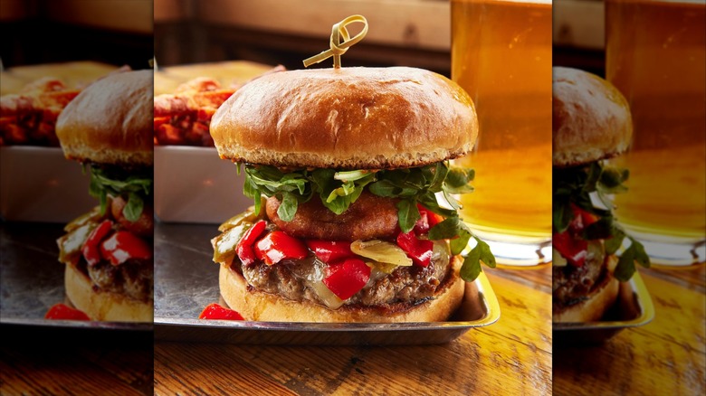 A bison burger stuffed with ingredients at Uneeda Burger in Seattle.