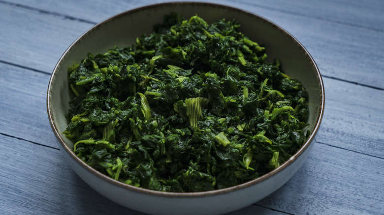 Saut&eacute;ed spinach in a bowl