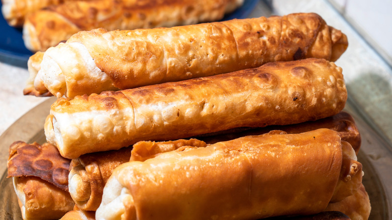 A plate of taquitos