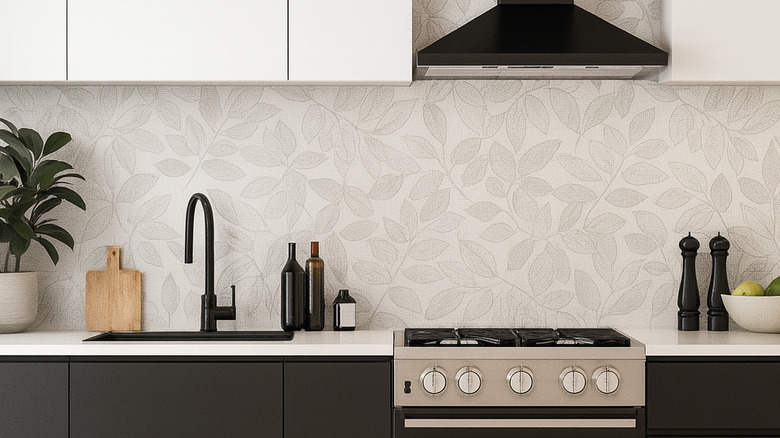 leaf wallpaper serving as kitchen stove backsplash