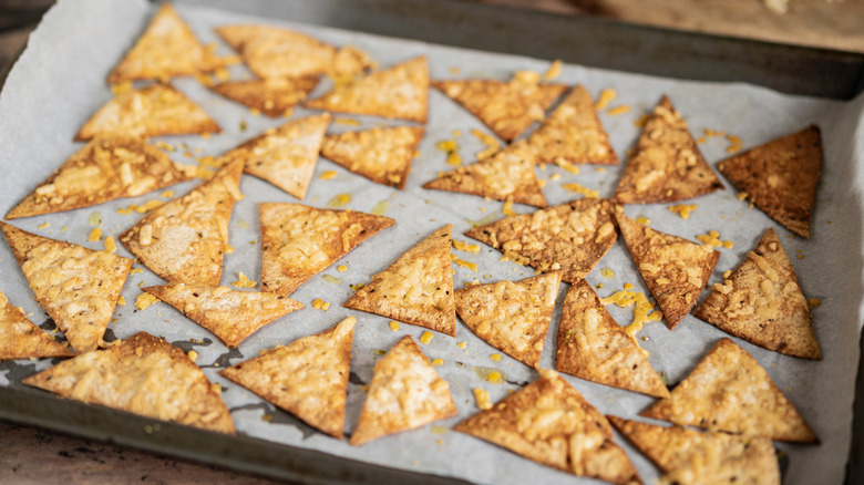 Tortilla chips on baking sheet