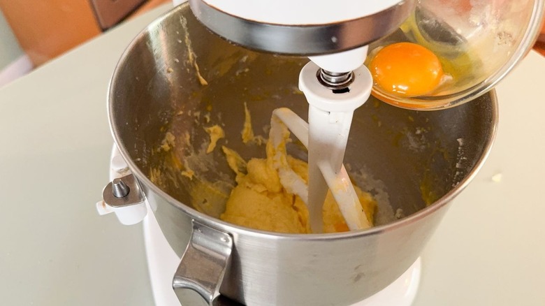 Beating yolks into butter and sugar in stand mixer bowl