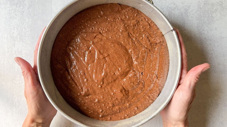 Gianduja chocolate cake batter in springform pan