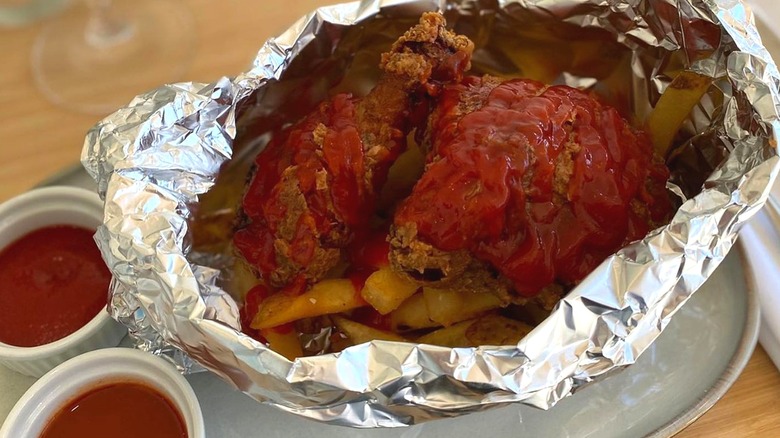 Chicken in the bag in a metal tin