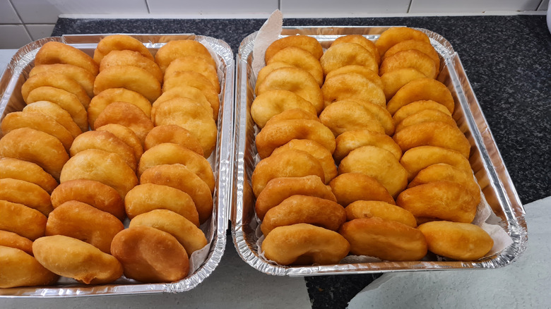 Caribbean Johnnycakes in tinfoil containers