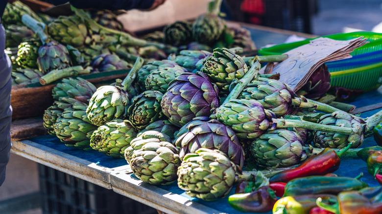 Artichokes on a table at a market
