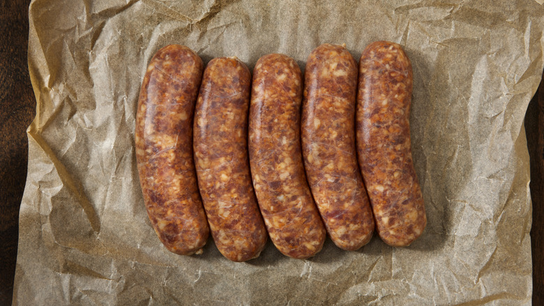 Raw sausage on butcher paper