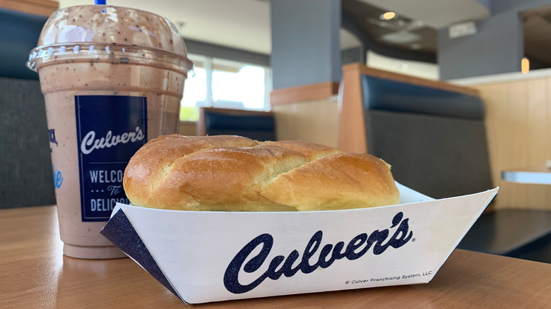Culver's sandwich and frozen custard sitting on a table