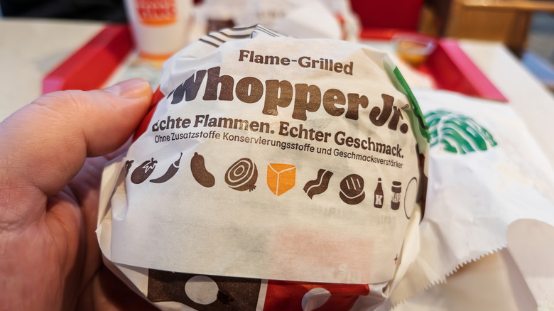 Person holding Whopper Jr.