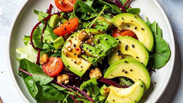 avocado salad with seeds and vinaigrette