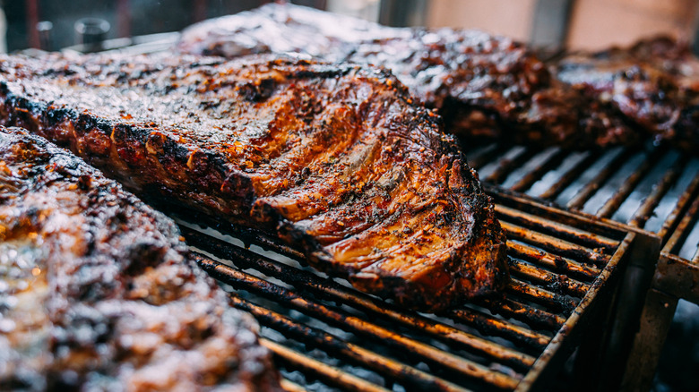 Barbecue ribs cooking on a grill