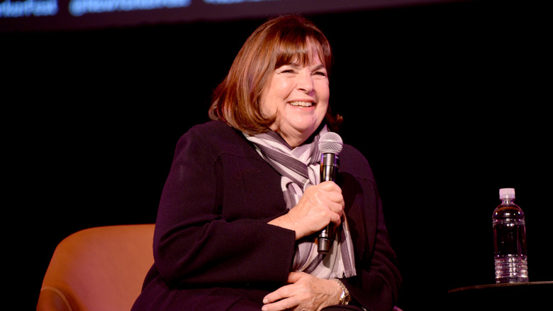 Celebrity chef Ina Garten sits on stage at an event.