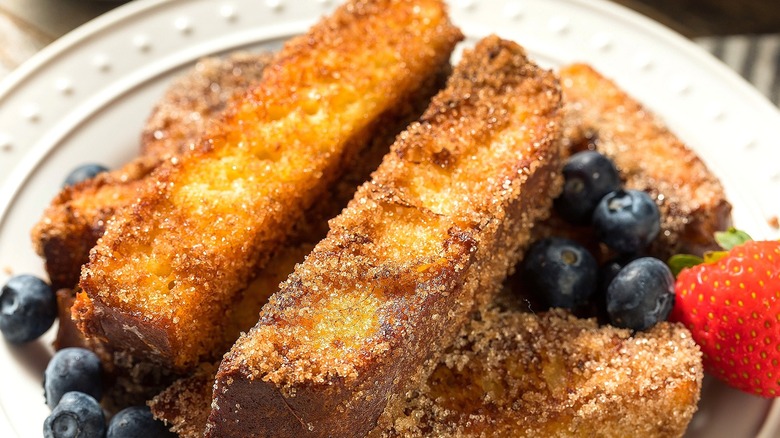 Closeup of French toast sticks coated in cinnamon sugar