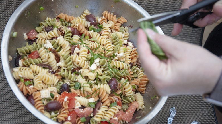 pasta salad being prepared