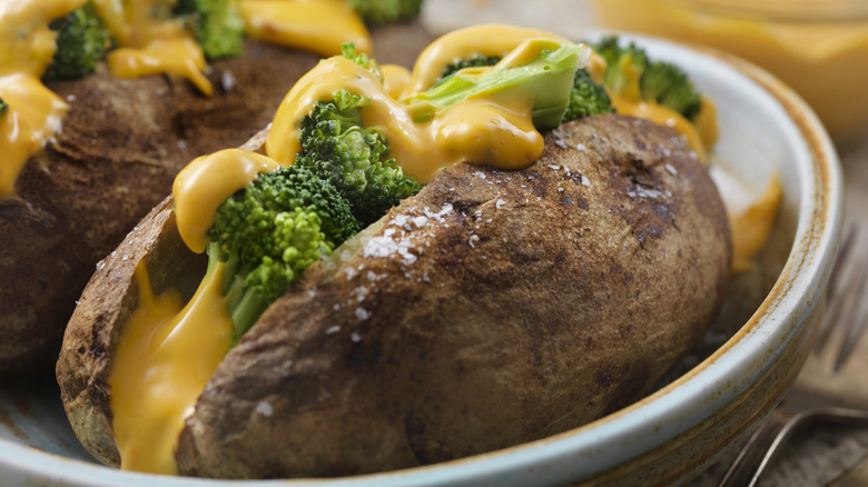 Baked potatoes with broccoli and cheese