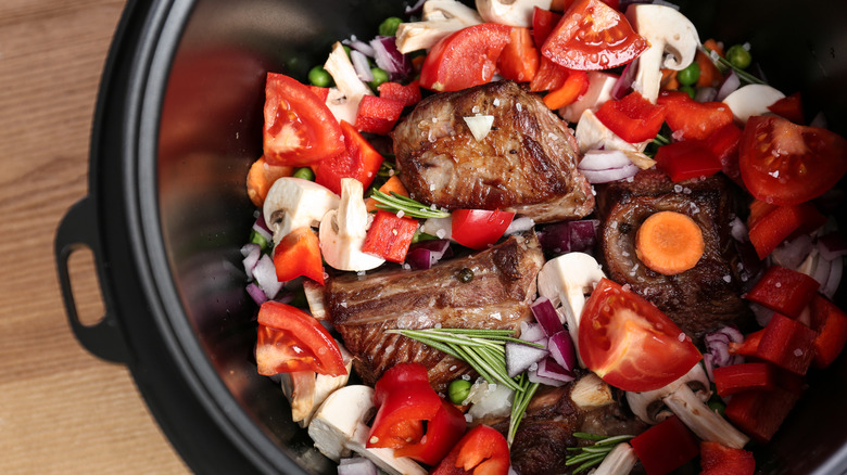 ribs with vegetables in the slow cooker