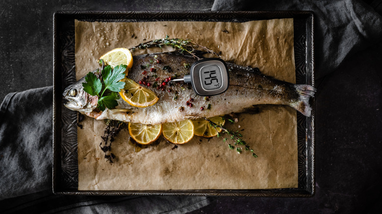 Whole fish with meat thermometer