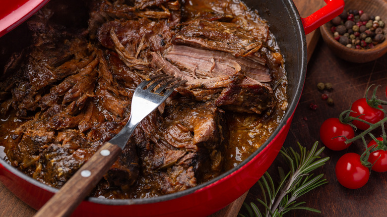 Fork in  Dutch oven of pot roast
