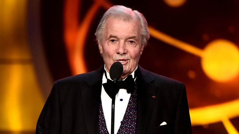 Celebrity chef Jacques Pépin appears on stage at an awards ceremony