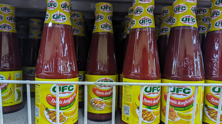 Several UFC banana ketchup on a shelf
