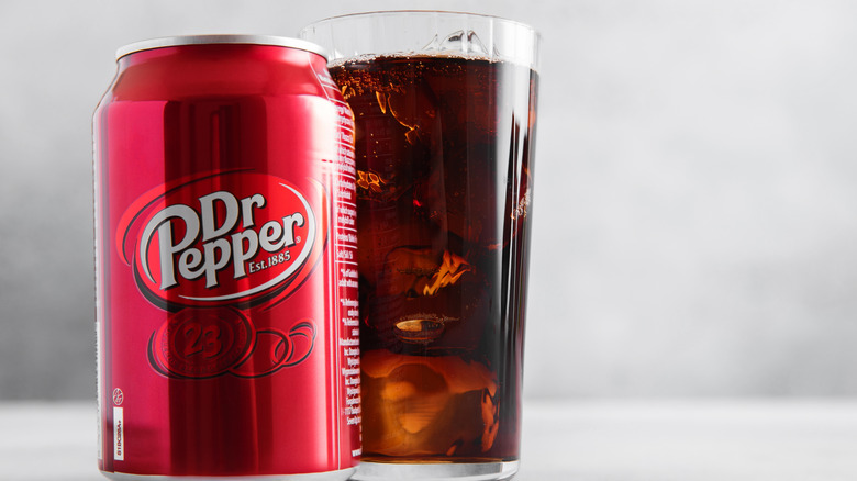 A can and a glass of Dr Pepper