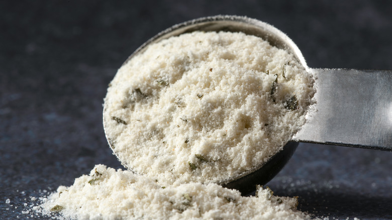Powdered ranch seasoning in a measuring spoon.