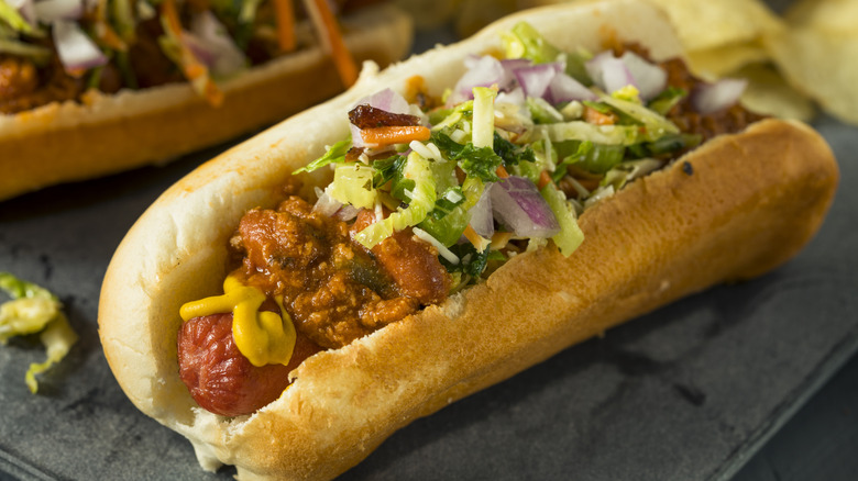 A homemade version of a West Virginia dog complete with mustard, chili, onions, and coleslaw