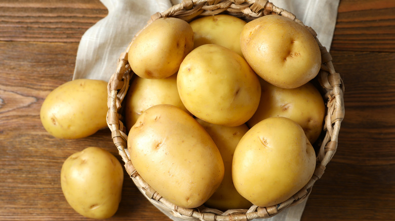 A basket of fresh potatoes.