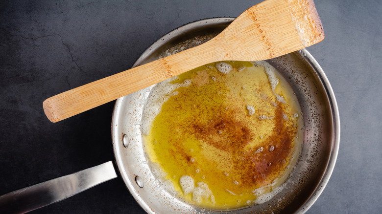 Pan of brown butter with spoon