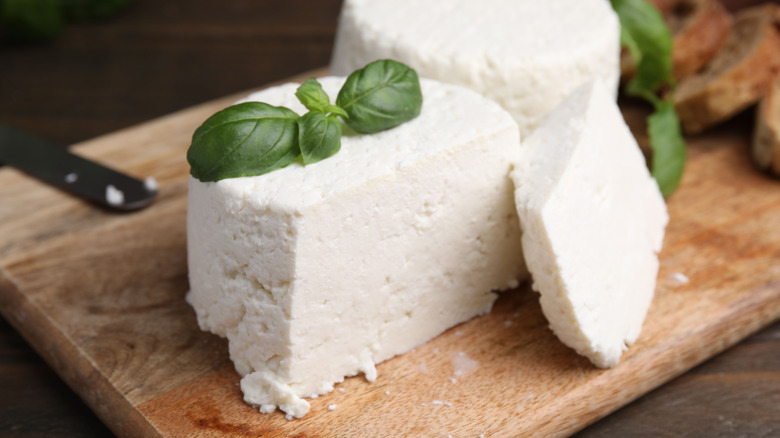 ricotta cheese on a wooden cutting board