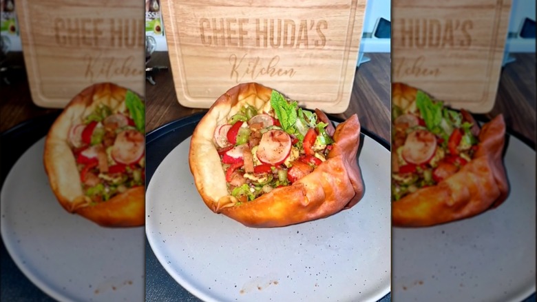 Lebanese fatoush salad in pita bread bowl