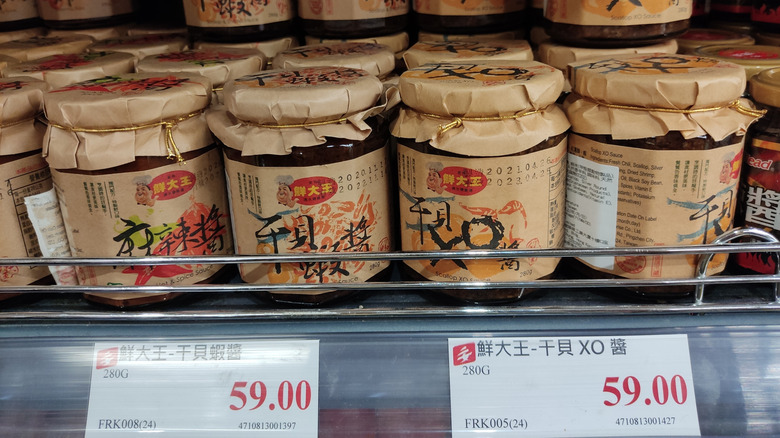 Jars of XO sauce on a shelf in a Hong Kong store.