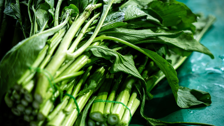 Close up of bunches of collard greens