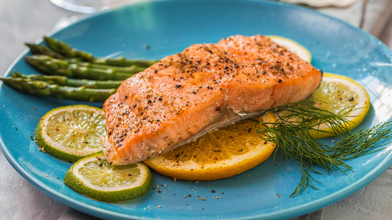 Baked salmon fillet over citrus