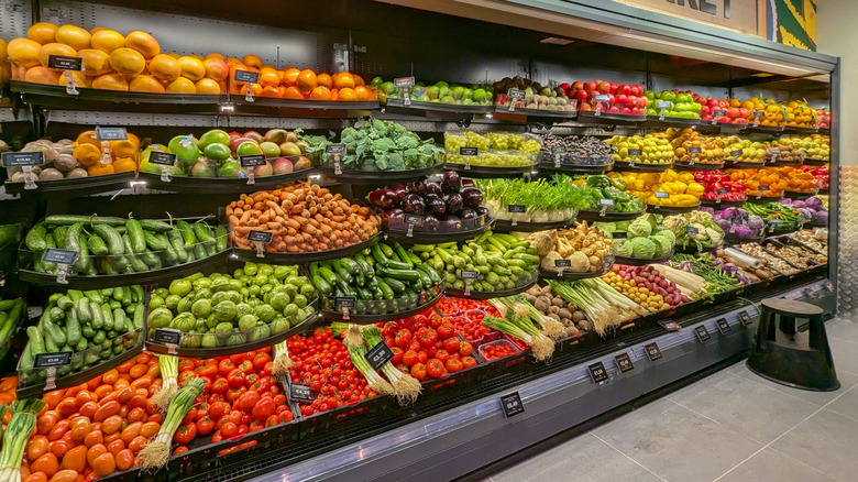 A colorful supermarket produce section.