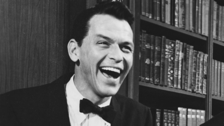 Black and white of Frank Sinatra laughing