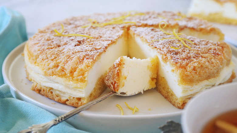 Lemon Ricotta Torte with a slice taken out of it