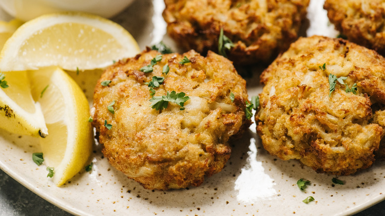Crab cakes served with lemon