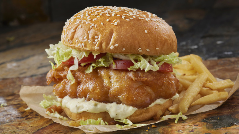 Beer Battered Fish Burger with Ice Burg Lettuce, Tomato, Tarter Sauce and Fries