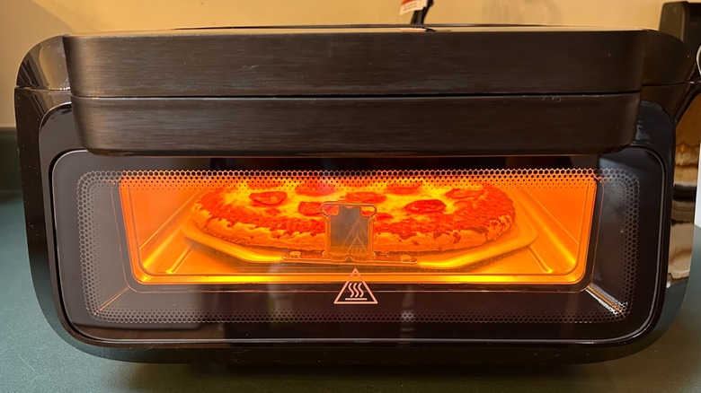 Frigidaire Indoor Pizza Oven baking a pizza