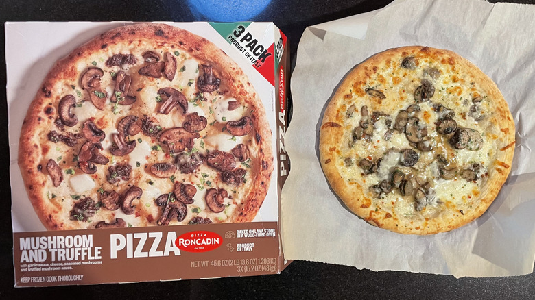 Mushroom pizza and box
