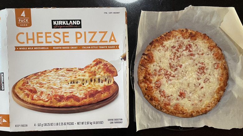 Cheese pizza and box