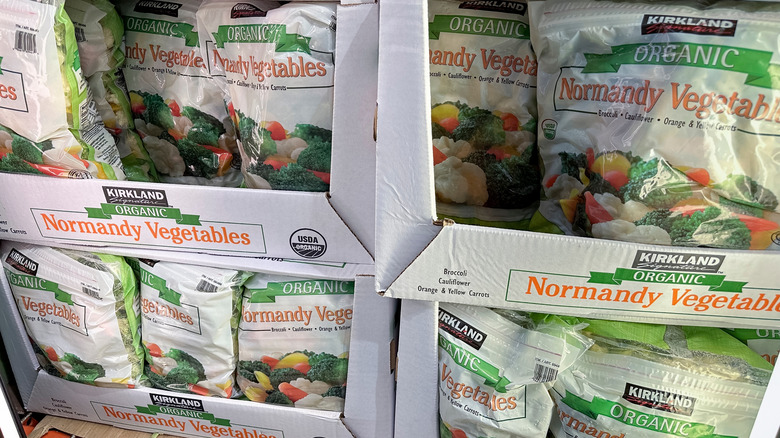 Bags of Kirkland Signature Organic Normandy Vegetables on display in Costco freezers