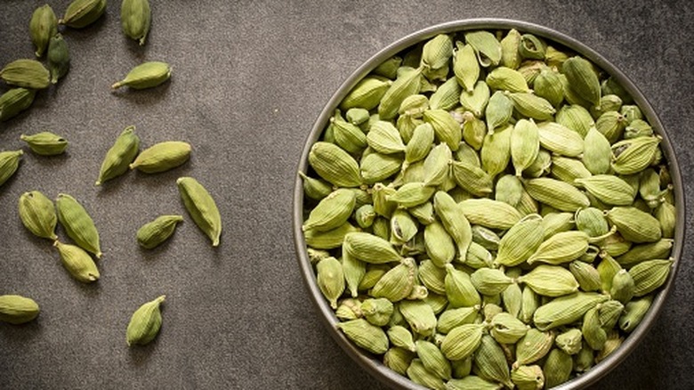 green cardamom pods in a bowl
