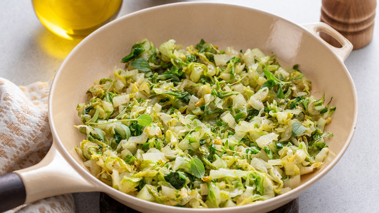 Chopped cabbage in a pan.
