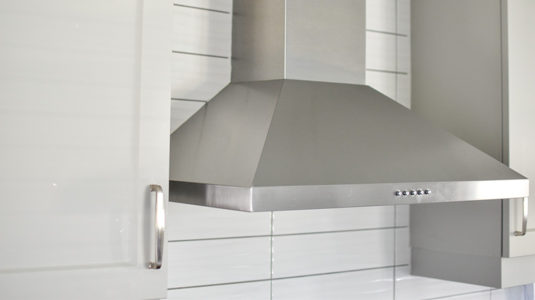 Range hood in white kitchen