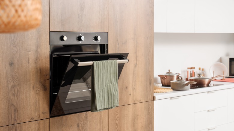 Wall oven with towel in kitchen