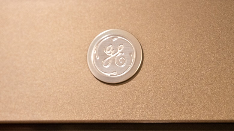 GE logo on appliance close-up