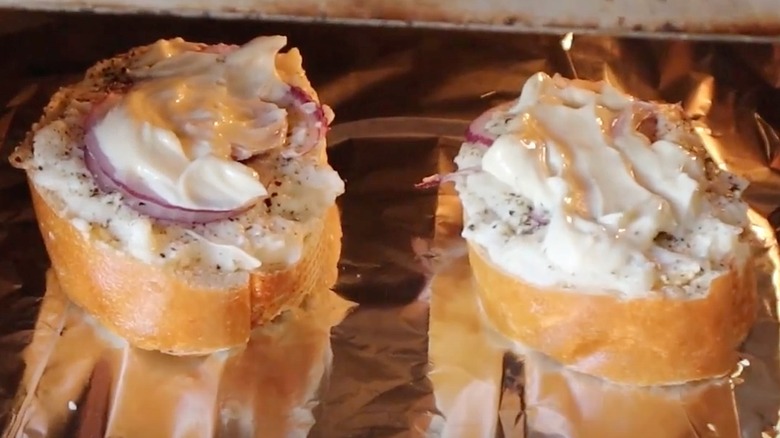 Gene Kelly's Greatest Man Sandwich in the World under a broiler